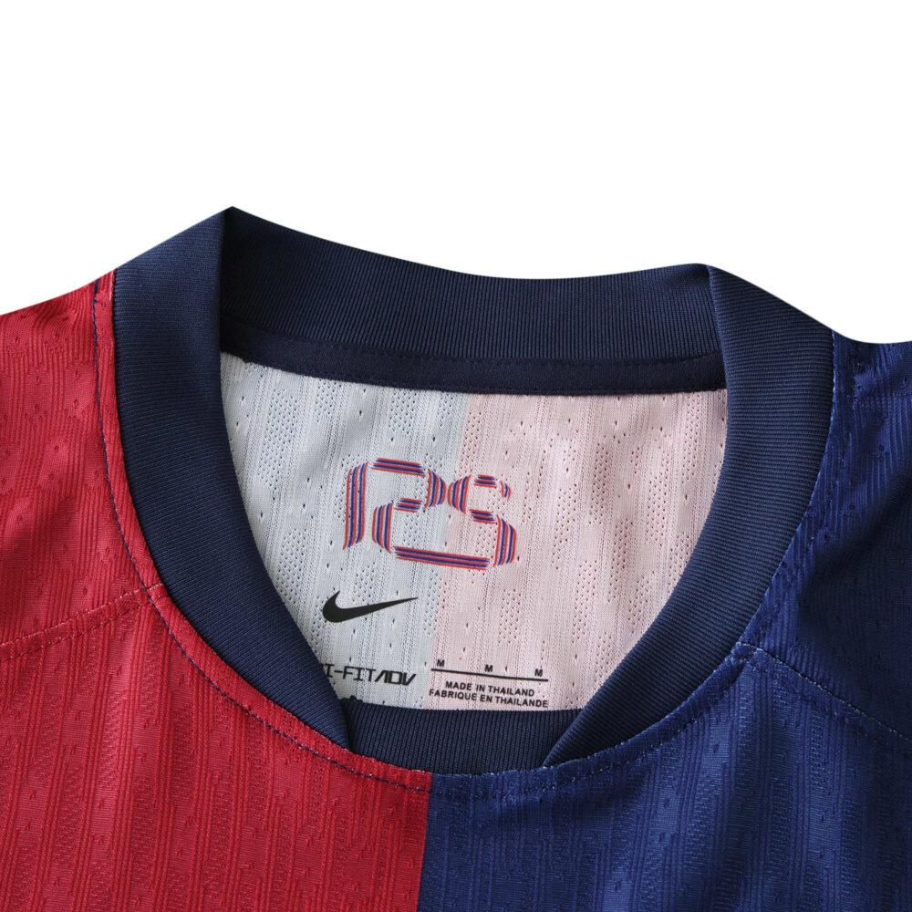 Close-up of the collar and neck tag area of a Barcelona x Coldplay (Special Release) Player Version jersey.
