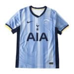 Tottenham x Travis Scott (Special Release) Fan Version jersey featuring light blue and navy stripes, Nike logo, and AIA sponsor branding.