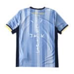 Back view of the Tottenham x Travis Scott special release fan version jersey, featuring "Tottenham" and "Cactus Jack" text.