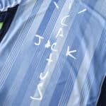 Tottenham x Travis Scott special release fan jersey featuring "JACK CACTUS" text on a blue striped background.