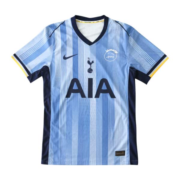 Tottenham x Travis Scott Player Version jersey in light blue with vertical stripes, featuring Nike and AIA logos.