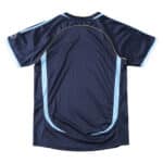 Rear view of the Argentina Retro Away 2006 Fan Version jersey, showcasing dark blue color with light blue accents and piping.