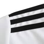 Close-up of the shoulder area of Argentina Retro Home 2014 Fan Version jersey, featuring three black stripes on a white background.