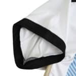 Close-up of the sleeve of the Argentina Retro Home 2014 Fan Version jersey, featuring a white base with black trim.