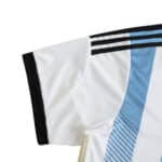 Close-up of the sleeve and shoulder details on Argentina Retro Home 2014 Fan Version jersey, featuring iconic stripes and blue accents.