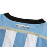 Close-up of the back collar area of the Argentina Retro Home 2014 fan version jersey, showing fabric texture and "Argentino" label.