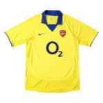 Arsenal Retro Away 2003/04 Fan Version Jersey, yellow with blue accents, Nike logo and O2 sponsor emblem on the front.