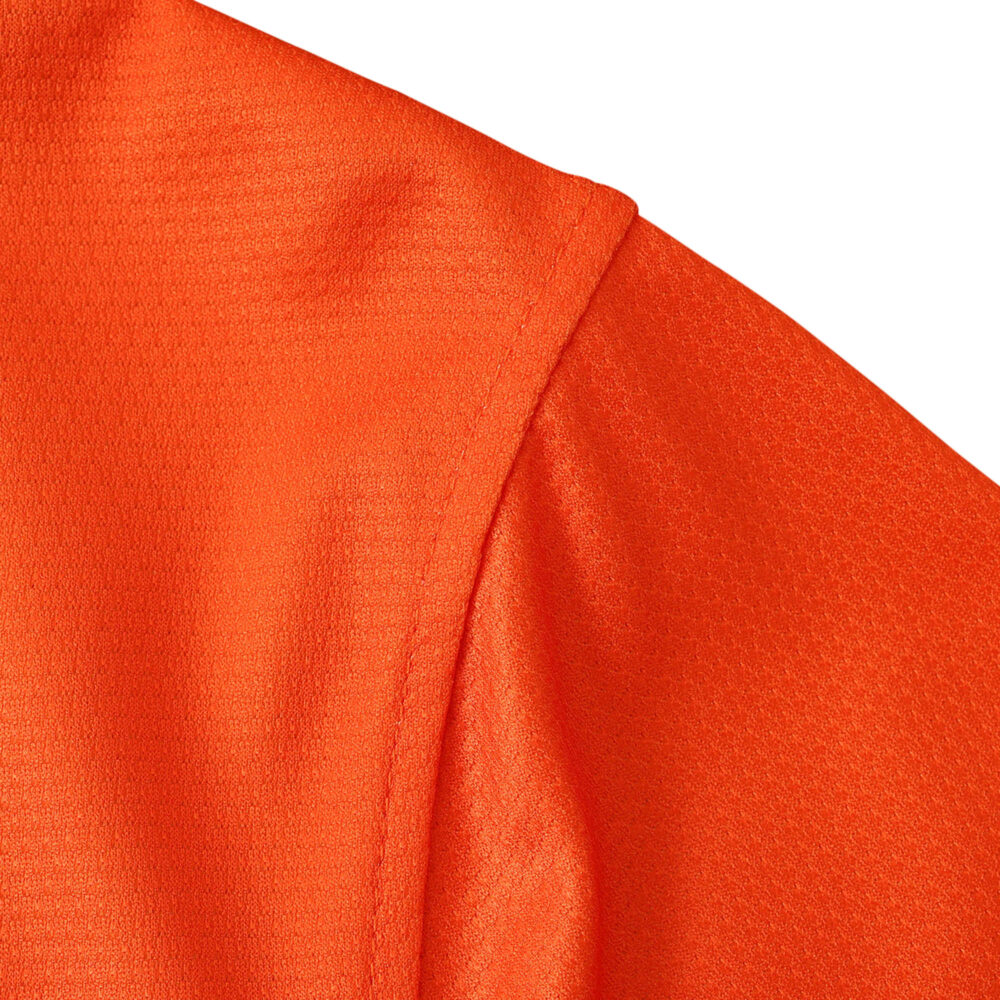Detail of the Barcelona Retro Away 2012/13 Fan Version jersey in vibrant orange, showcasing the fabric and stitching quality.