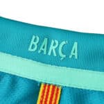 Close-up of the collar detailing on the Barcelona Retro Third 2016/17 Fan Version jersey showing "BARÇA" text and yellow-red stitching.