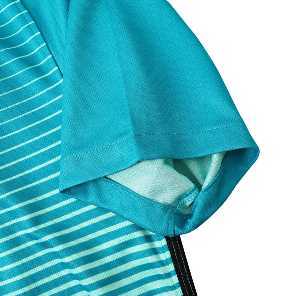 Close-up of the sleeve of a Barcelona Retro Third 2016/17 Fan Version jersey showing teal fabric with horizontal stripes.