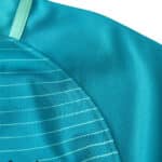 Close-up of the Barcelona Retro Third 2016/17 jersey, highlighting its teal color and fine horizontal stripe details.