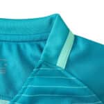 Close-up of the Barcelona Retro Third 2016/17 Fan Version jersey collar in teal with light green trim.