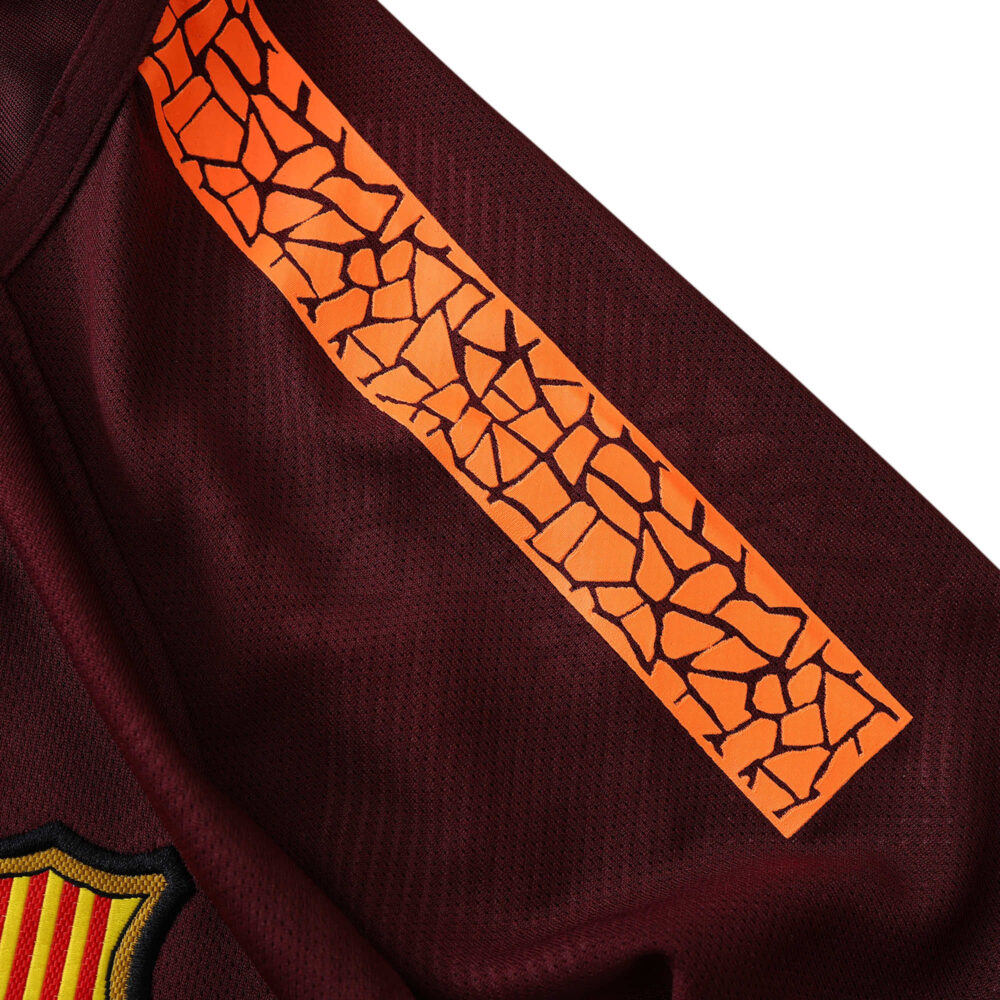 Detail view of Barcelona Retro Third 2017/18 Fan Version jersey, showcasing orange cracked pattern on the shoulder stripe.