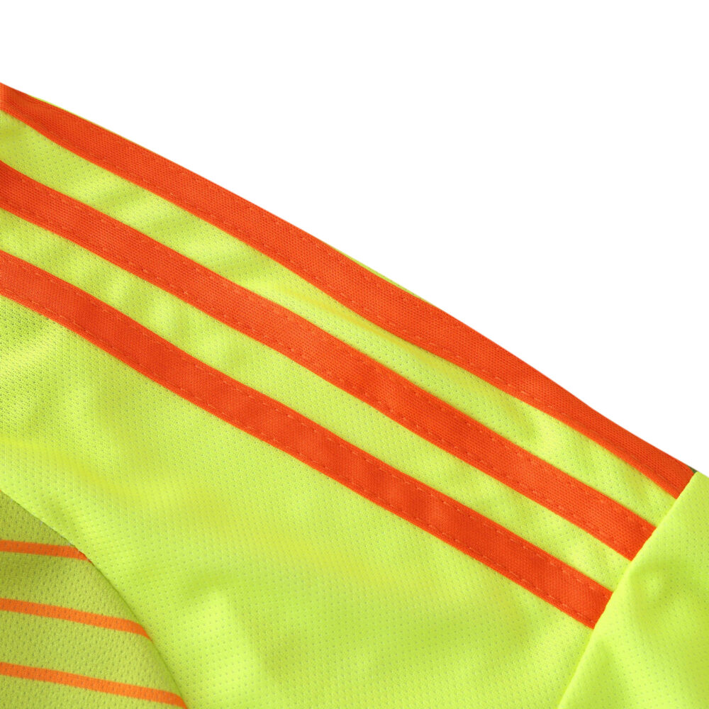 Close-up of neon green Bayern Munich Goalkeeper jersey for the 2024/25 season featuring bright orange stripes on the sleeve.