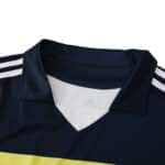 Chelsea Retro Away Fan Version Jersey 2011/12, close-up of the collar and shoulders, featuring dark blue color with white stripes.