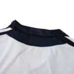 Close-up of the back collar area of Chelsea Retro Away 2011/12 Fan Version jersey, showing white fabric and dark trim details.