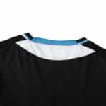 Close-up of the neckline on Chelsea Retro Third Fan Version jersey from 2011/12, showcasing black fabric with blue and white details.