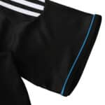 Close-up of the sleeve detail for Chelsea Retro Third | 2011/12 | Fan Version, featuring black fabric with a blue accent stripe.