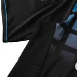 Close-up of the Chelsea Retro Third 2011/12 Fan Version jersey, featuring black fabric with blue accents and a checkered pattern.