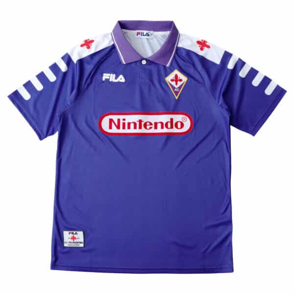 Fiorentina Retro Home 1998/99 Fan Version: Purple jersey with Nintendo logo, FILA branding, and club crest on the chest.