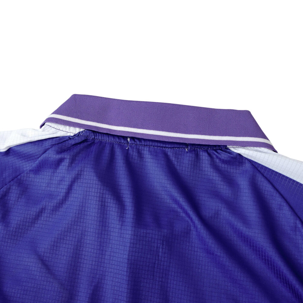Close-up view of the collar and shoulder area of the Fiorentina Retro Home jersey from the 1998/99 season, Fan Version.