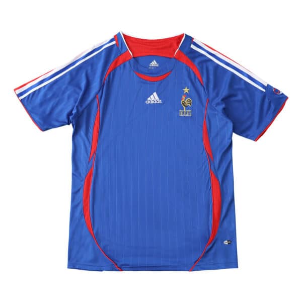 France Retro Home | 2006 | Fan Version. Blue short-sleeve jersey with red accents, Adidas logo, and French football crest on the front.
