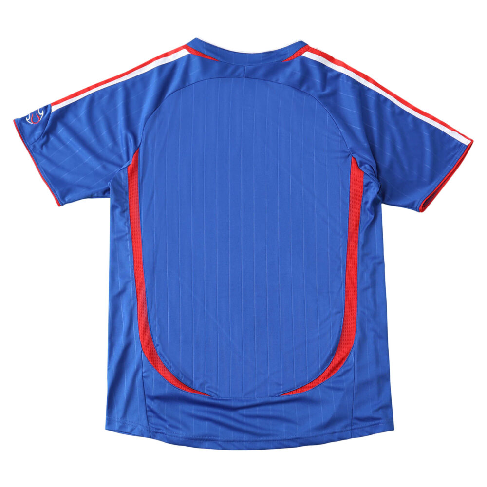 Back view of the France Retro Home 2006 Fan Version jersey, featuring blue fabric with red and white accents.