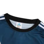 Close-up of the collar part of the Germany Retro Goalkeeper jersey, 2002 Fan Version. Featuring Adidas logo and classic design.
