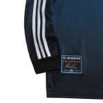 Germany Retro Goalkeeper Jersey | 2002 Fan Version. Blue shade, white stripes on sleeve, "O. Kahn Goalkeeping" patch at the bottom.
