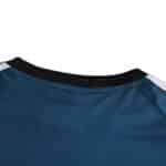 Close-up of the collar and upper back of the Germany Retro Goalkeeper shirt | 2002 | Fan Version, in dark teal with black trim.
