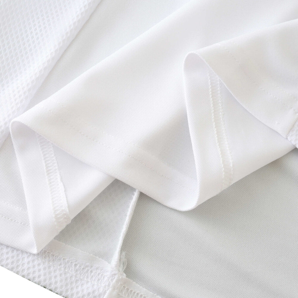 Close-up view of fabric used in the Germany Retro Home | 2002 | Fan Version jersey, highlighting material and stitching.