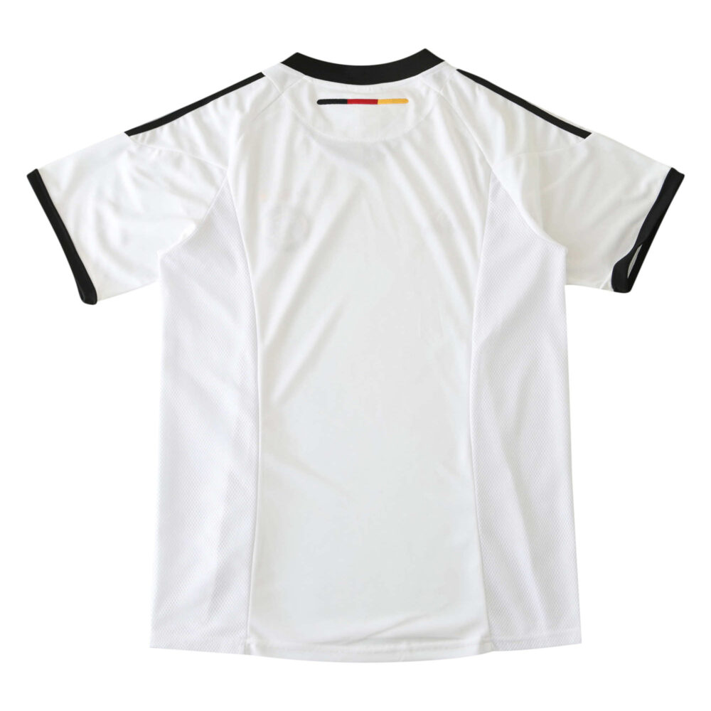Back view of the Germany Retro Home 2002 Fan Version jersey, primarily white with black accents on the sleeves and collar.