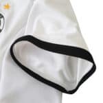 Close-up of the sleeve detail on the Germany Retro Home 2002 Fan Version jersey, featuring black trim and white fabric.
