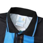 Close-up view of Inter Milan Retro Home 1992/93 jersey, displaying the collar and inner label with product details.