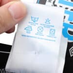 Close-up of the care label on an Inter Milan Retro Home | 1992/93 | Fan Version shirt showing washing instructions.