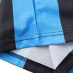 Close-up of the stitching on the Inter Milan Retro Home 1992/93 Fan Version jersey, showing blue and black stripes.