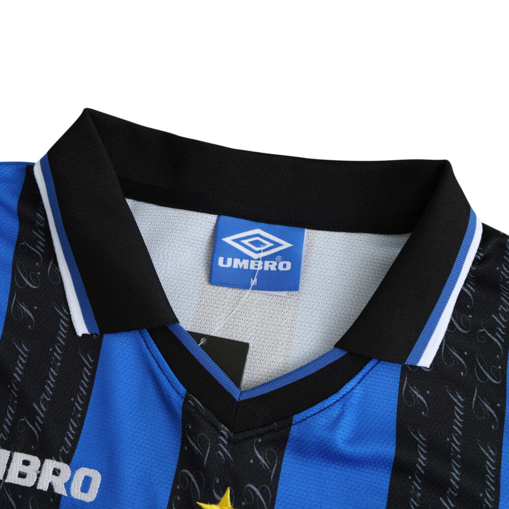 Close-up of Inter Milan Retro Home Jersey 1997/98 Fan Version, featuring black and blue stripes with Umbro logo on the collar.