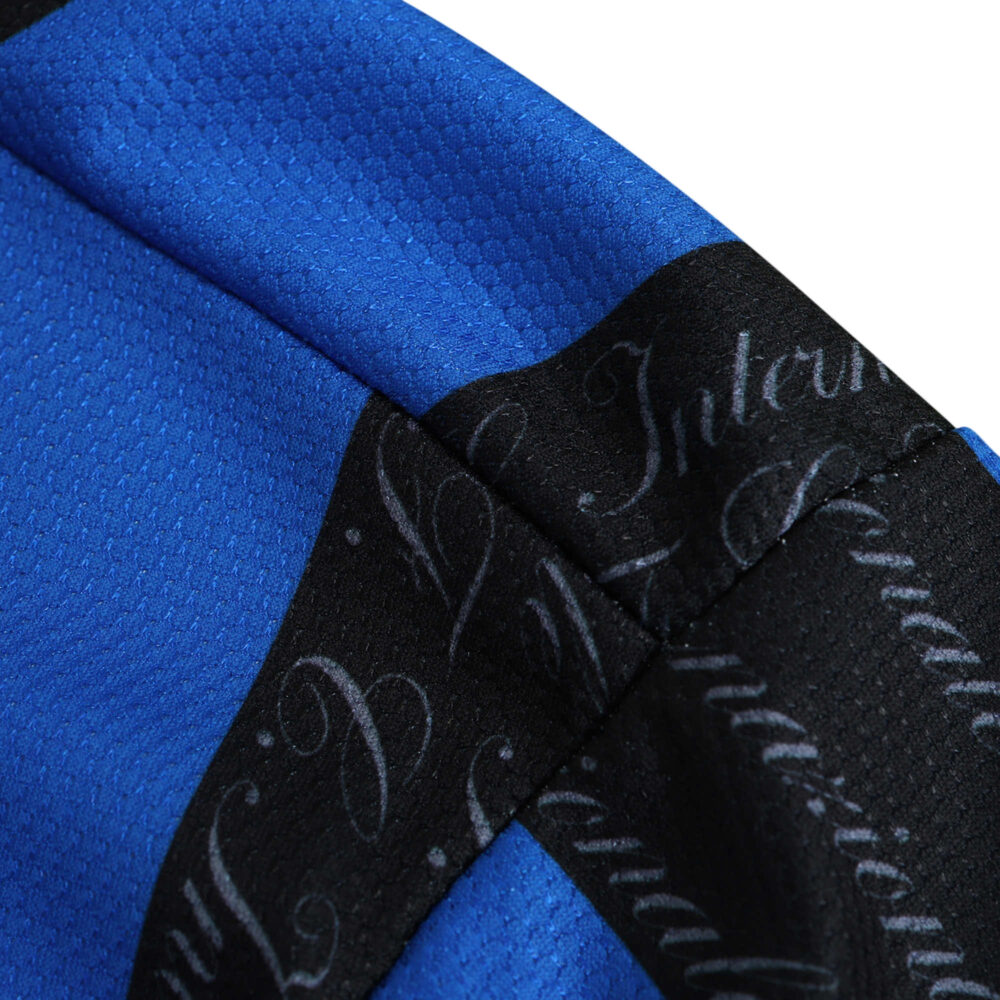 Close-up of Inter Milan Retro Home 1997/98 Fan Version jersey showing blue fabric and team name printed on black stripe.