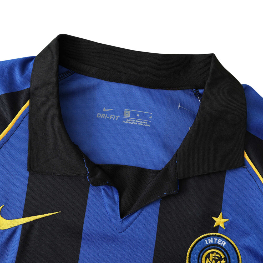 Inter Milan Retro Home | 2001/02 | Fan Version jersey featuring black collar, blue and black stripes, Nike logo, and team crest.
