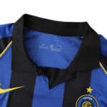 Inter Milan Retro Home | 2001/02 | Fan Version jersey featuring black collar, blue and black stripes, Nike logo, and team crest.