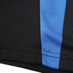 Close-up of Inter Milan Retro Home 2002/03 Fan Version jersey, showing black and blue stripes on the fabric.