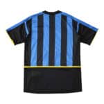 Back view of Inter Milan Retro Home 2002/03 Fan Version jersey displaying blue and black stripes with yellow accents.
