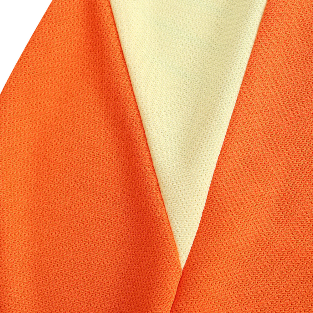 Close-up of the Italy Goalkeeper 2024 fan version jersey in orange and cream.