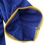 Close-up of the sleeve hem of a Juventus Retro Away 2004/05 Fan Version jersey in blue with yellow trim stitching.