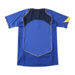 Back view of the Juventus Retro Away 2004/05 fan version jersey in blue with yellow accents.