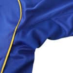 Close-up of the Juventus Retro Away 2004/05 Fan Version jersey in blue with yellow piping.