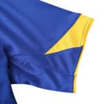 Close-up of the sleeve of Juventus Retro Away 2004/05 Fan Version jersey, featuring blue and yellow color-block design.