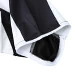 Close-up of the sleeve detail on a Juventus Retro Home Fan Version jersey from the 2004/05 season, showing stitching and fabric texture.