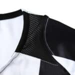 Close-up of the black and white striped Juventus Retro Home fan jersey from the 2004/05 season, showing collar details.