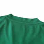 Close-up of the back neckline detail of the Leeds United Goalkeeper Fan Version jersey in green for the 2024/25 season.